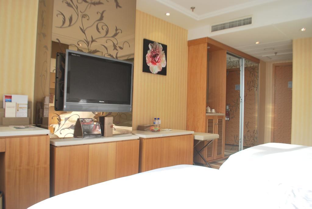 The Center Hotel Weihai Habitación foto